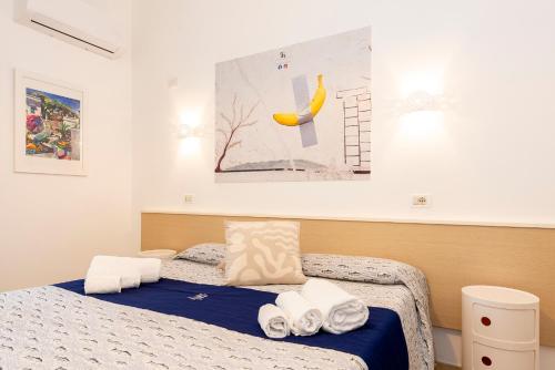 Postel nebo postele na pokoji v ubytování Hotel Villa Rita