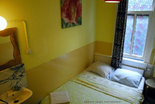 Katil atau katil-katil dalam bilik di Hotel Tamara