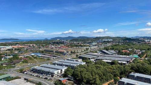 an overhead view of a city with buildings and roads at K Avenue High Floor Studio Balcony with Sunrise View in Kota Kinabalu