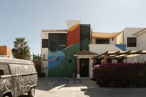 a van parked in front of a house at Grand Villa with Private Patio & Parking by Tasman in San José del Cabo