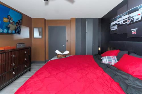 Ένα ή περισσότερα κρεβάτια σε δωμάτιο στο Spacious 3BR Condo in DTWN