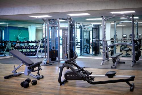 a gym with several treadmills and exercise machines at Westdrift Manhattan Beach, Autograph Collection in Manhattan Beach