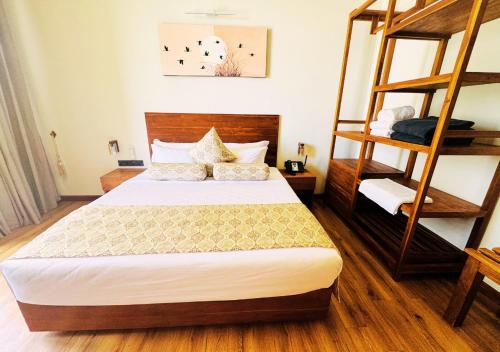 Ένα ή περισσότερα κρεβάτια σε δωμάτιο στο Diyakawa Boutique Hotel