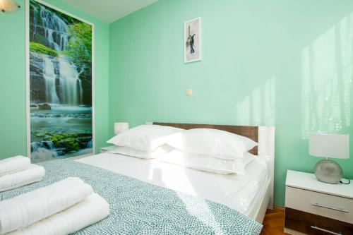 Postel nebo postele na pokoji v ubytování Apartment Jozo