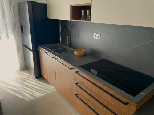 a kitchen with a sink and a counter top at Vasto Marina Dreamhouse in Vasto