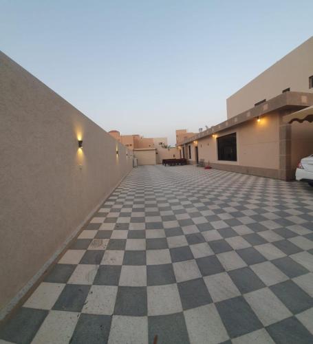 a view of a checkered floor in a building at عوالي الصفا للضّيافه in Buraydah
