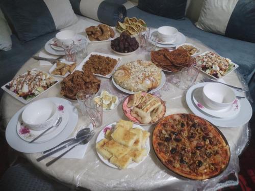 a table with a bunch of food on it at almou auberge imilchil in Imilchil