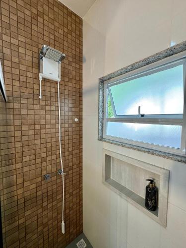 Bilik mandi di Casa na Serra com Área de Lazer