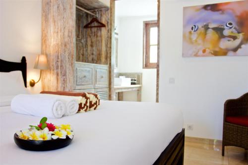 Postel nebo postele na pokoji v ubytování OK Divers Resort & Spa