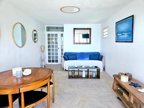 Ένα ή περισσότερα κρεβάτια σε δωμάτιο στο Vue mer exceptionnelle, Calme & tout confort, plage à pied