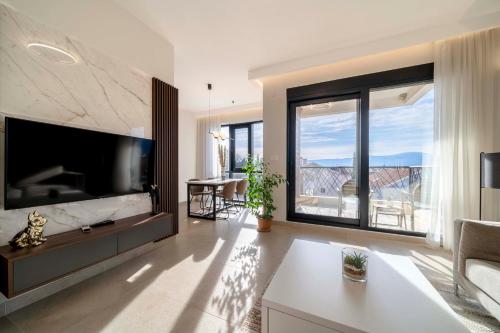 Μια τηλεόραση ή/και κέντρο ψυχαγωγίας στο N2 Lux Two Bedroom