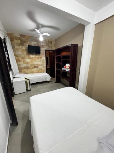 Katil atau katil-katil dalam bilik di Hotel Nossa Senhora da Conceição
