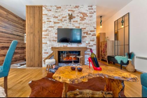 TV a/nebo společenská místnost v ubytování Blue Lux