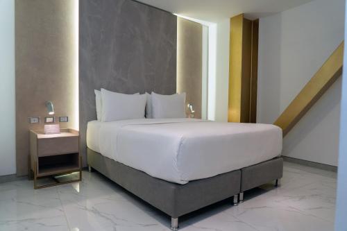 Postel nebo postele na pokoji v ubytování Delamar Hotel