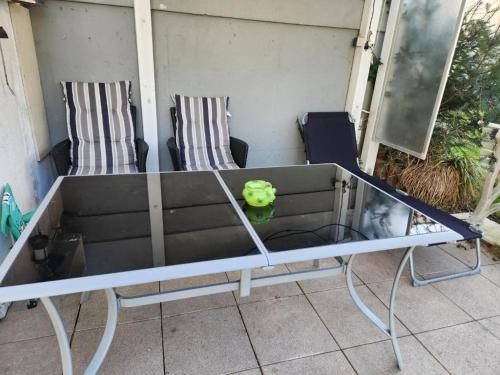 Posezení v ubytování Sonnenschein 0L mit Terrasse und Garten