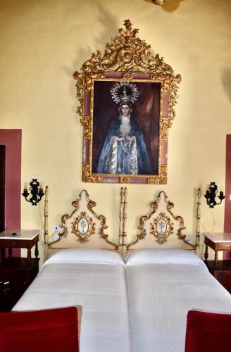 Ένα ή περισσότερα κρεβάτια σε δωμάτιο στο Casa Palacio de los Palma