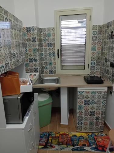 Kuchyň nebo kuchyňský kout v ubytování B&B EmaNik