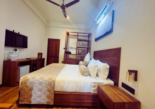 Ένα ή περισσότερα κρεβάτια σε δωμάτιο στο Diyakawa Boutique Hotel