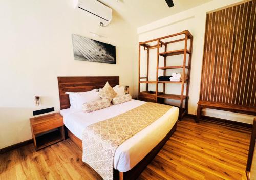 Ένα ή περισσότερα κρεβάτια σε δωμάτιο στο Diyakawa Boutique Hotel