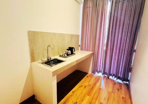 Kuchyň nebo kuchyňský kout v ubytování Diyakawa Boutique Hotel