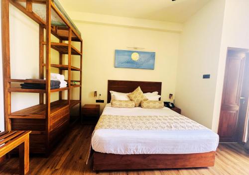 Ένα ή περισσότερα κρεβάτια σε δωμάτιο στο Diyakawa Boutique Hotel