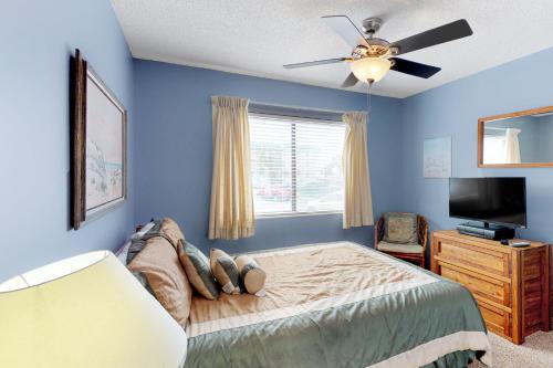 Ένα ή περισσότερα κρεβάτια σε δωμάτιο στο Plantation East #3117