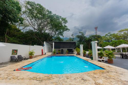 a swimming pool at a resort at Hotel Tropical San Jeronimo in San Jerónimo
