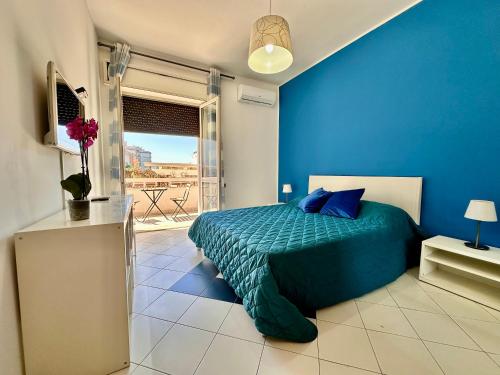 Ένα ή περισσότερα κρεβάτια σε δωμάτιο στο b&b holiday