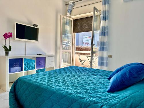 Ένα ή περισσότερα κρεβάτια σε δωμάτιο στο b&b holiday