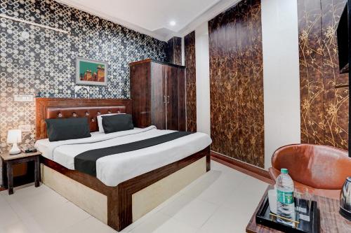 Ένα ή περισσότερα κρεβάτια σε δωμάτιο στο Hotel O BG Hotel