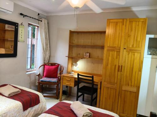 Postel nebo postele na pokoji v ubytování Seaside sunny stay plus