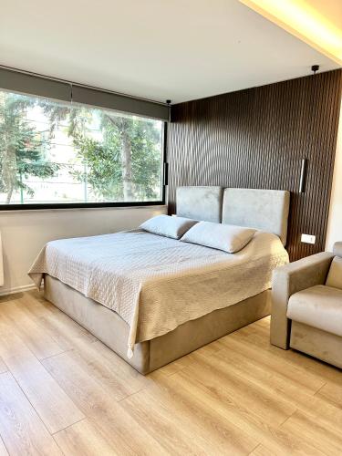 Postel nebo postele na pokoji v ubytování Bejler City Center