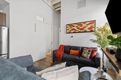 a living room with two couches and a couch at Downtown Free Parking Garage - 5 min walk OTR in Cincinnati