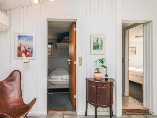 a room with a door leading to a bedroom at 5 person holiday home in Thyholm-By Traum in Thyholm
