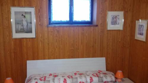Tempat tidur dalam kamar di La Maison De Chantal