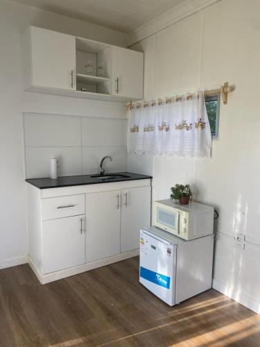 Kuchyň nebo kuchyňský kout v ubytování Green House Modulos Yoli #1