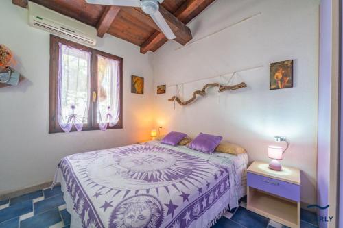 Postel nebo postele na pokoji v ubytování Villetta Teodorina - By Searly