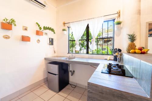 a kitchen with a sink and a counter top at Best Location in Sayulita - Walk to Everything in Sayulita