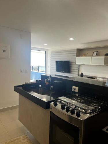 Kuchyň nebo kuchyňský kout v ubytování Cobertura VISTA MAR NA PRAIA FORMOSA - CABEDELO