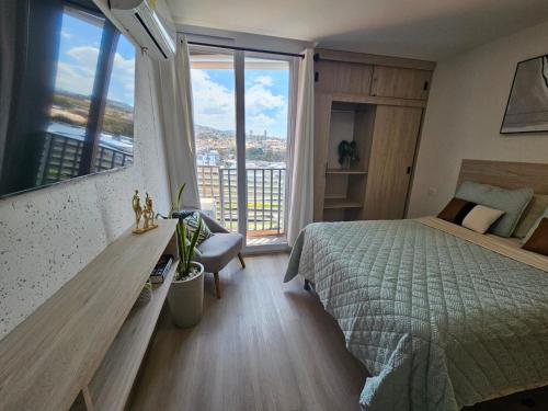 Postel nebo postele na pokoji v ubytování Opal-203 Condominio Confortable en Ecodistrito
