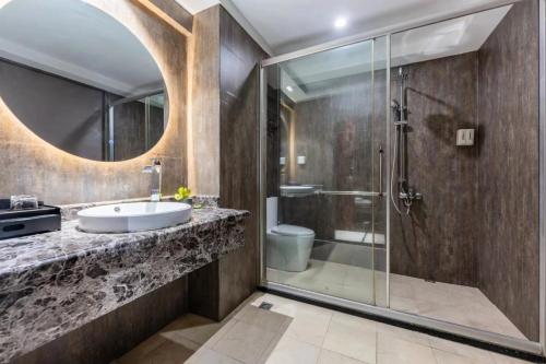 Vannituba majutusasutuses Foshan Zhongying Holiday Hotel