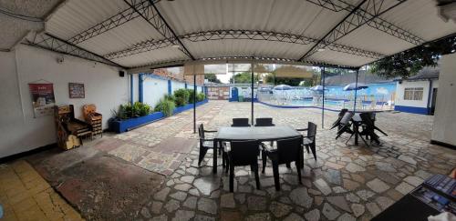 Bazén v ubytování Hotel Guaipa Melgar nebo v jeho okolí