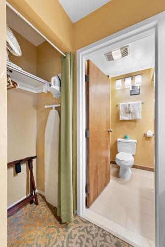a bathroom with a toilet and a shower at The Morgan Hotel San Simeon in San Simeon
