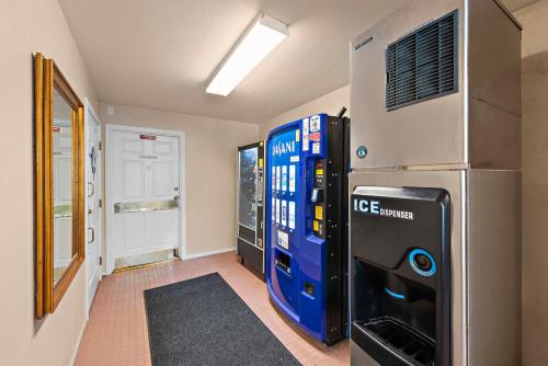 a room with a large blue gas dispenser next to aperature at The Morgan Hotel San Simeon in San Simeon