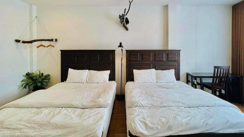 Postel nebo postele na pokoji v ubytování Nhà Của Táo HomeStay Quy Nhơn