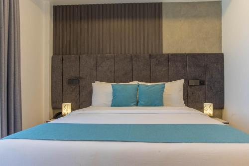 Ein Bett oder Betten in einem Zimmer der Unterkunft Whaleshark Beach
