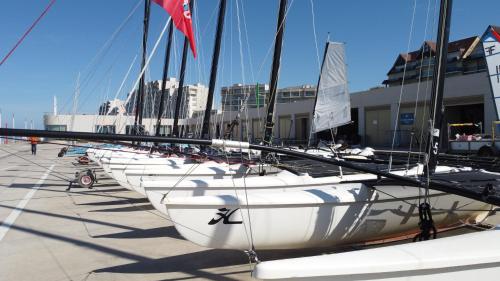 a row of sailboats lined up in a dock at Appart Côte d'Opale in Condette