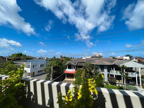 a view of houses from the balcony of a house at Uyana View in Moratuwa