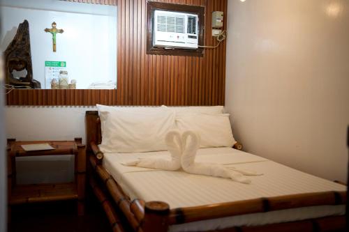 Katil atau katil-katil dalam bilik di Kalipay sa Baybay, Your Private Escape