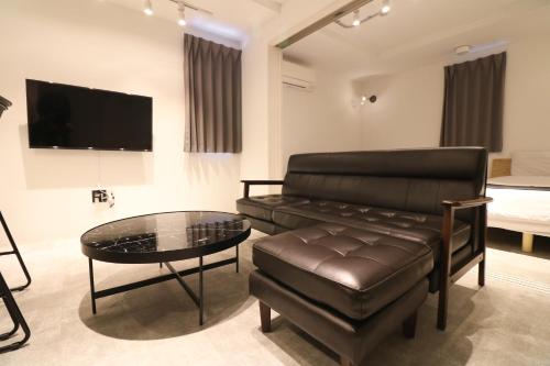Hotel Wheat Waccaにあるテレビまたはエンターテインメントセンター